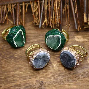Detailed view of handmade oversized natural druzy stone rings with adjustable bands