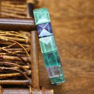 Close-up detail of translucent square rainbow fluorite beads in a vintage bracelet