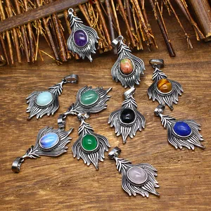 Vintage peacock feather pendants with assorted natural stones and antique finish