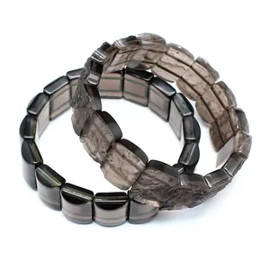 Macro detail of natural Arizona Saffordite meteorite bracelets with polished and raw edges