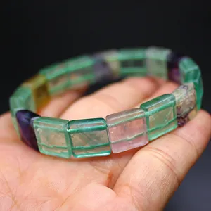 Macro detail of natural colorful fluorite bracelet with translucent square stones