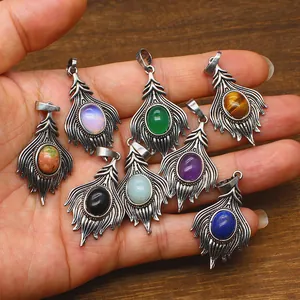 Vintage antique silver pendants with assorted natural stones in peacock feather design