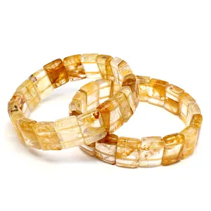 Detailed view of natural yellow hematoid quartz crystal bracelets with faceted rectangle beads