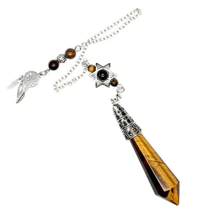 Detailed view of tiger's eye crystal pendulum with hexagram and dreamcatcher charms