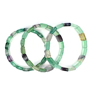 Detailed view of natural square colorful fluorite gemstone beads on elastic bracelets