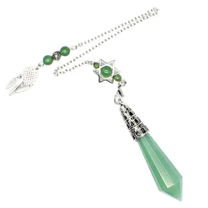 Close-up of green crystal prism pendulum with star and dreamcatcher charm