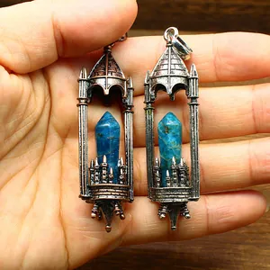 Detailed macro shot of retro medieval castle pendants with natural blue apatite crystals