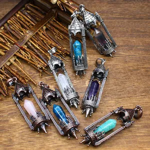 Detail view of various vintage medieval castle pendants with colorful crystal points