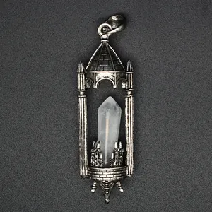 Macro detail of a vintage medieval castle pendant featuring a natural hexagonal crystal.