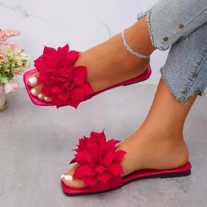 Vibrant rose red flat slide sandals featuring oversized 3D fabric flower decoration for summer
