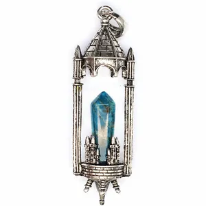 Detail view of a gothic castle pendant with a blue hexagonal crystal pillar stone.