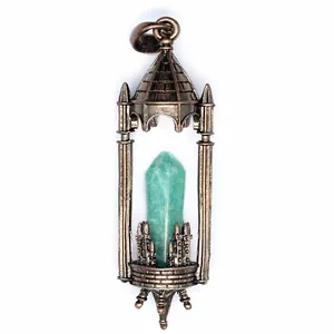 Detail of retro medieval castle pendant with natural hexagonal amazonite crystal point