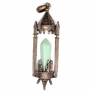 Close-up of vintage medieval castle cage pendant with green hexagonal crystal point