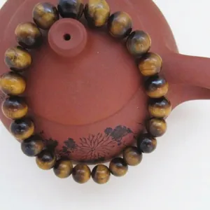 Bracciale in perline di occhio di tigre naturale da 8mm su teiera in terracotta