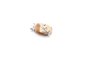 Detailed view of an oval natural stone pendant with a silver rose flower metal overlay