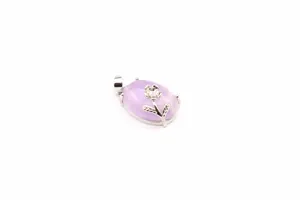 Detail view of a lavender crystal pendant with an elegant silver flower design overlay.