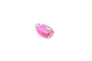 Macro detail view of pink rose quartz pendant featuring a silver floral ornament design