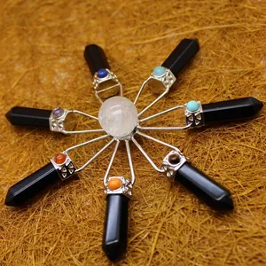 Seven chakra crystal healing pendulum with clear quartz sphere and obsidian points