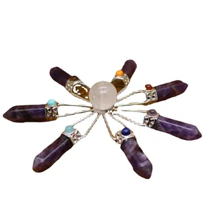 Healing crystal starburst ornament with amethyst points and clear quartz center