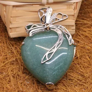 Green aventurine heart shaped pendant necklace with silver bow ribbon decoration.