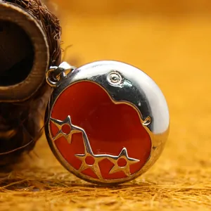 Exquisite round red crystal pendant with silver crescent moon and stars celestial design