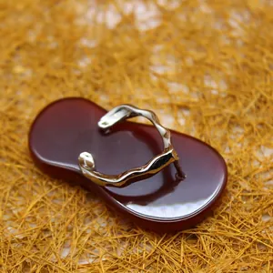 Unique tiger's eye stone flip-flop pendant with decorative wavy silver-tone metal strap