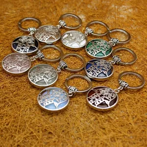 Ethnic Hamsa hand keychains with various natural gemstone pendants for luck.