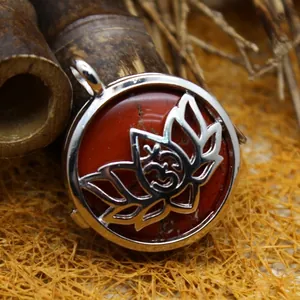 Vintage silver lotus pendant necklace with red stone and Om symbol