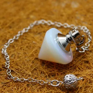 White opal stone dowsing pendulum pendant in a top shape with delicate silver chain