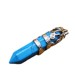 Ethnic style turquoise hexagonal crystal point pendant with silver dragon wrap detail