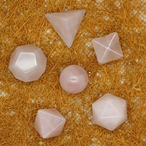 Set of seven rose quartz geometric shapes for home decor and spiritual meditation