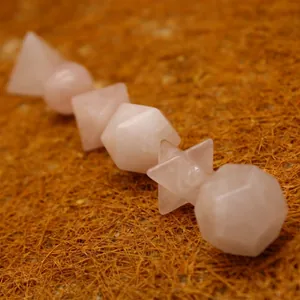 Polished rose quartz geometric shapes set for meditation and home decor
