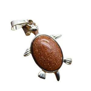 Colgante de tortuga marina único con incrustación de piedra de oro marrón brillante