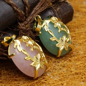 Ethnic style crystal flower pendants featuring intricate gold filigree design