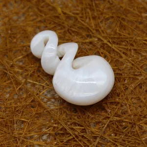 Elegant white mother of pearl swan-shaped pendant with iridescent shell luster