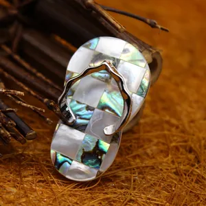 Unique flip-flop shape pendant necklace crafted with iridescent abalone shell pieces