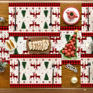Detailansicht der Weihnachts-Tischläufer-Sets mit Karomuster und Rentieren aus Leinen.
