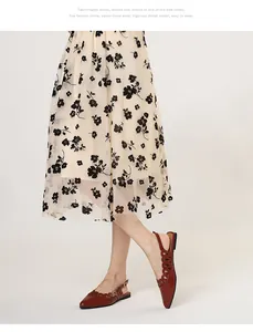 Elegant retro pointed-toe slingback flat shoes featuring intricate hollow-out designs