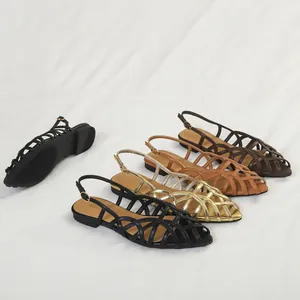 Elegant women's woven flat sandals with hollow-out design and ankle strap in multiple colors