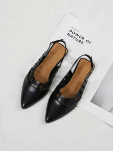 Vintage black pointed-toe slingback flats with elegant laser-cut hollow-out design