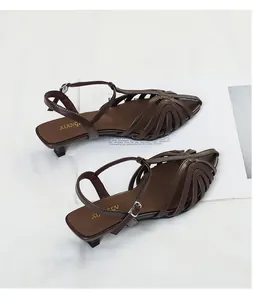 Detailed view of dark brown hollow-out pointed toe kitten heel sandals for women's commute
