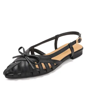 Elegant black woven sandals with bow detail and slingback strap