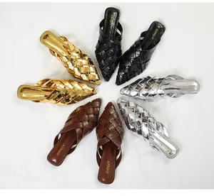 Detailed overhead view of woven pointed-toe mules in gold, silver, black, and brown.
