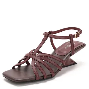 Elegant burgundy square toe sandals with criss-cross straps and geometric kitten heel.