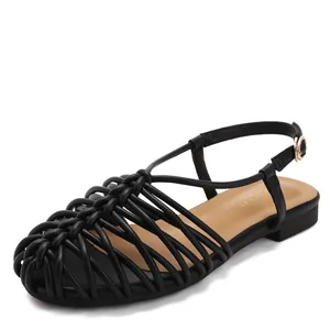 Handmade woven closed-toe Roman sandals with flat sole and adjustable buckle strap