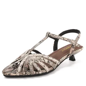 Elegant snakeskin patterned kitten heel sandals with a pointed toe and T-strap ankle closure