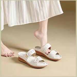 Stylish white wedge sandals for women featuring elegant flower and retro stitching.