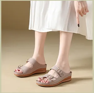 Premium women's peep-toe wedge sandals with stylish double buckle straps in taupe