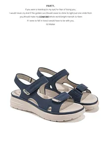 Detailed macro view of women's navy blue sports sandals with adjustable Velcro straps