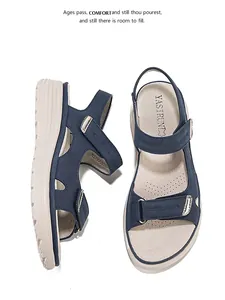 Close-up detail of navy blue sporty women's sandals featuring adjustable Velcro straps